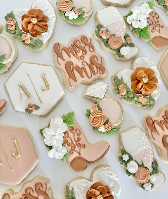 Custom decorated sugar cookies — bridal set with piped flowers and gold monograms